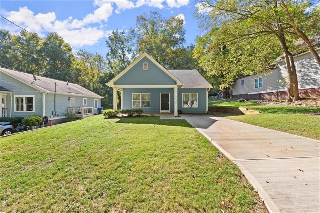 front view of a house with a yard