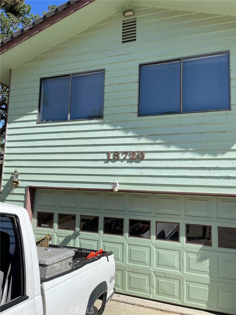 a front view of a house with balcony