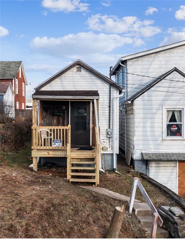 a view of front of house with deck