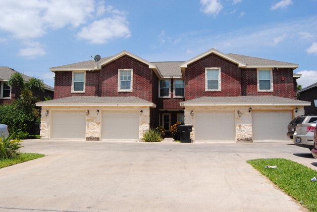 front view of a house with yard