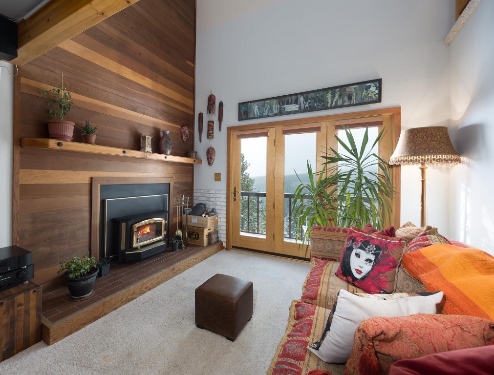 a bedroom with furniture and a fireplace