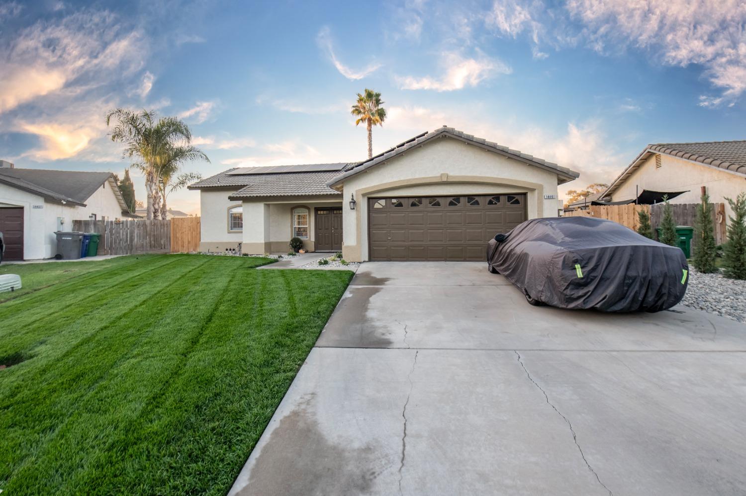 a house view with a garden space