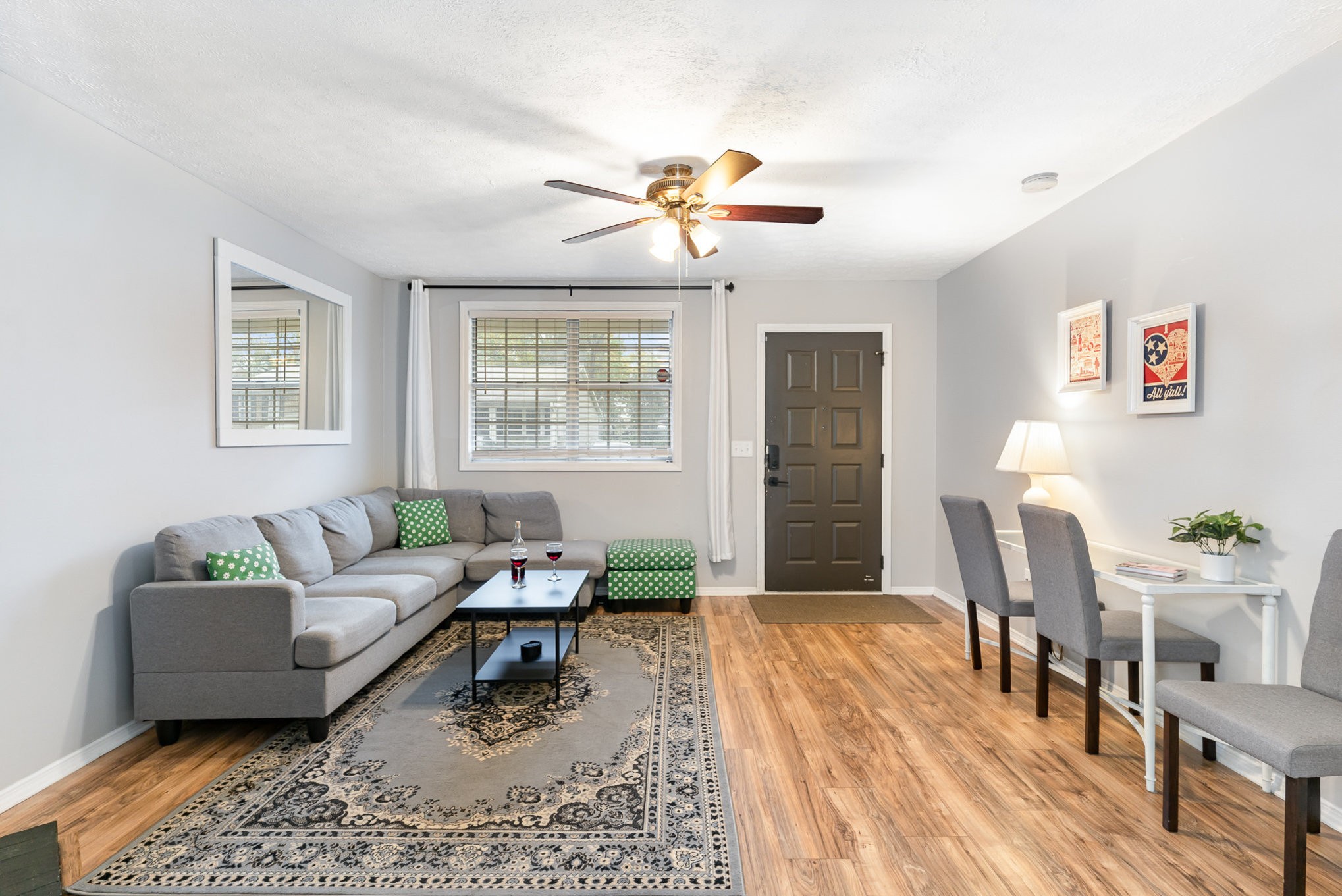 a living room with furniture and a window