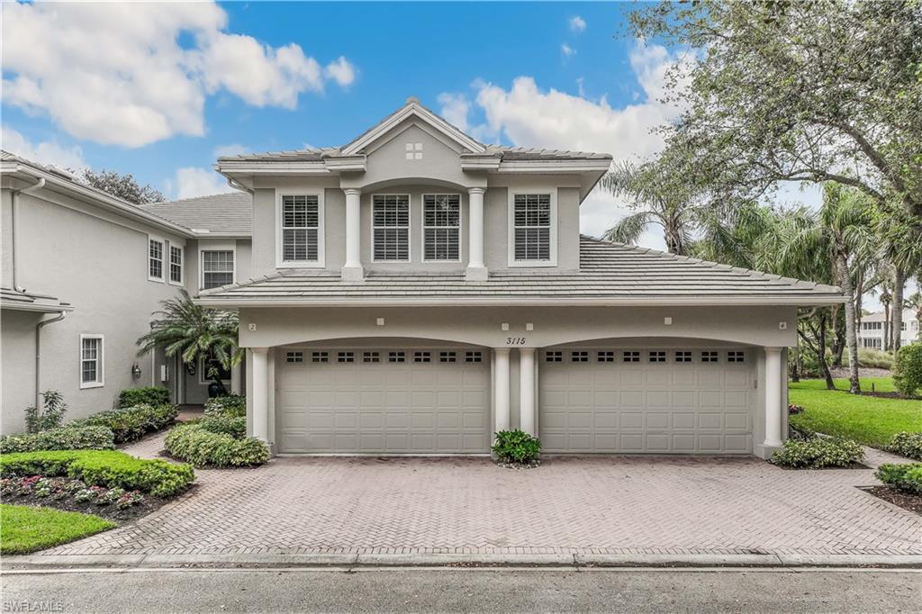 1st floor with attached 2 car garage