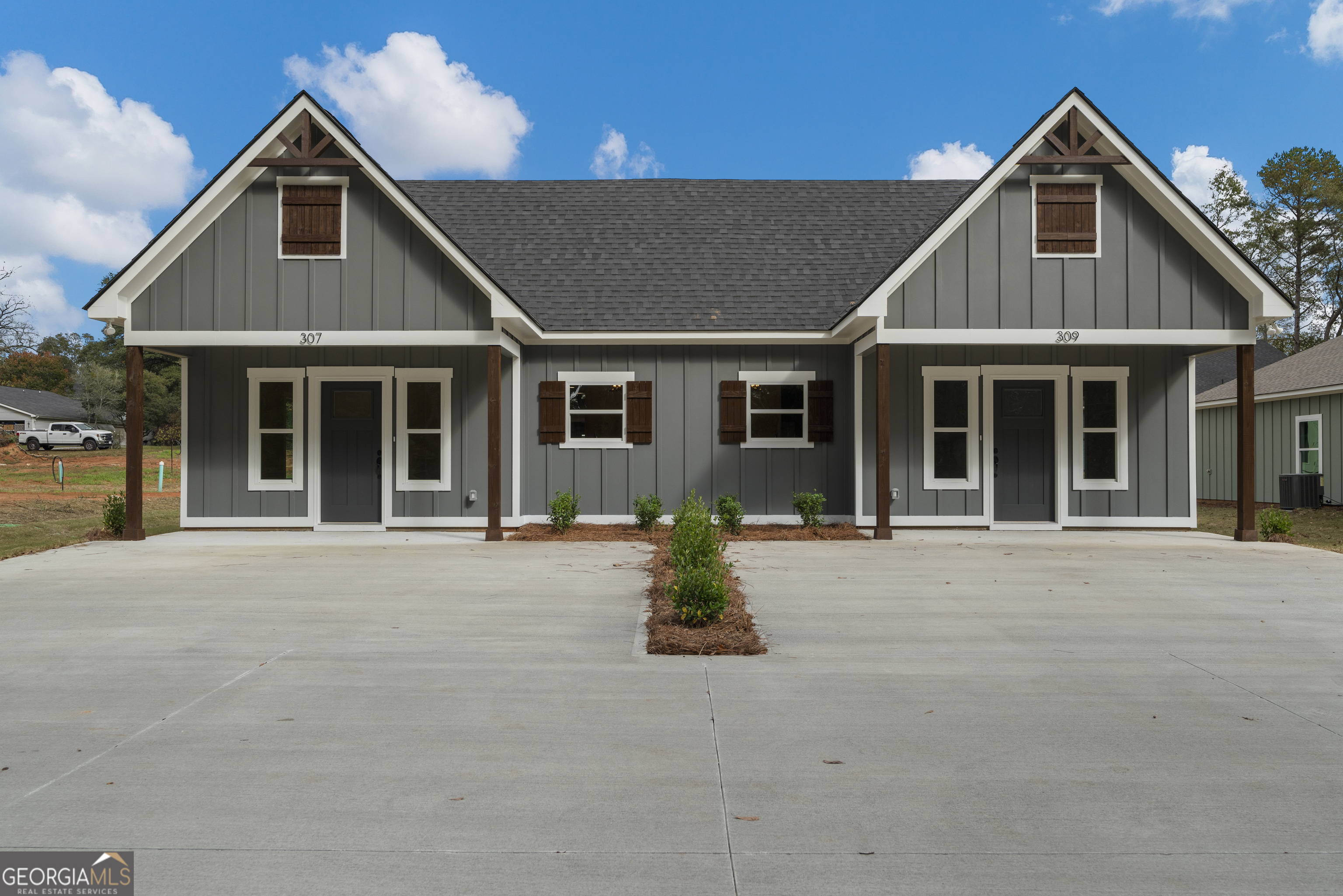 a front view of a house with a outdoor space