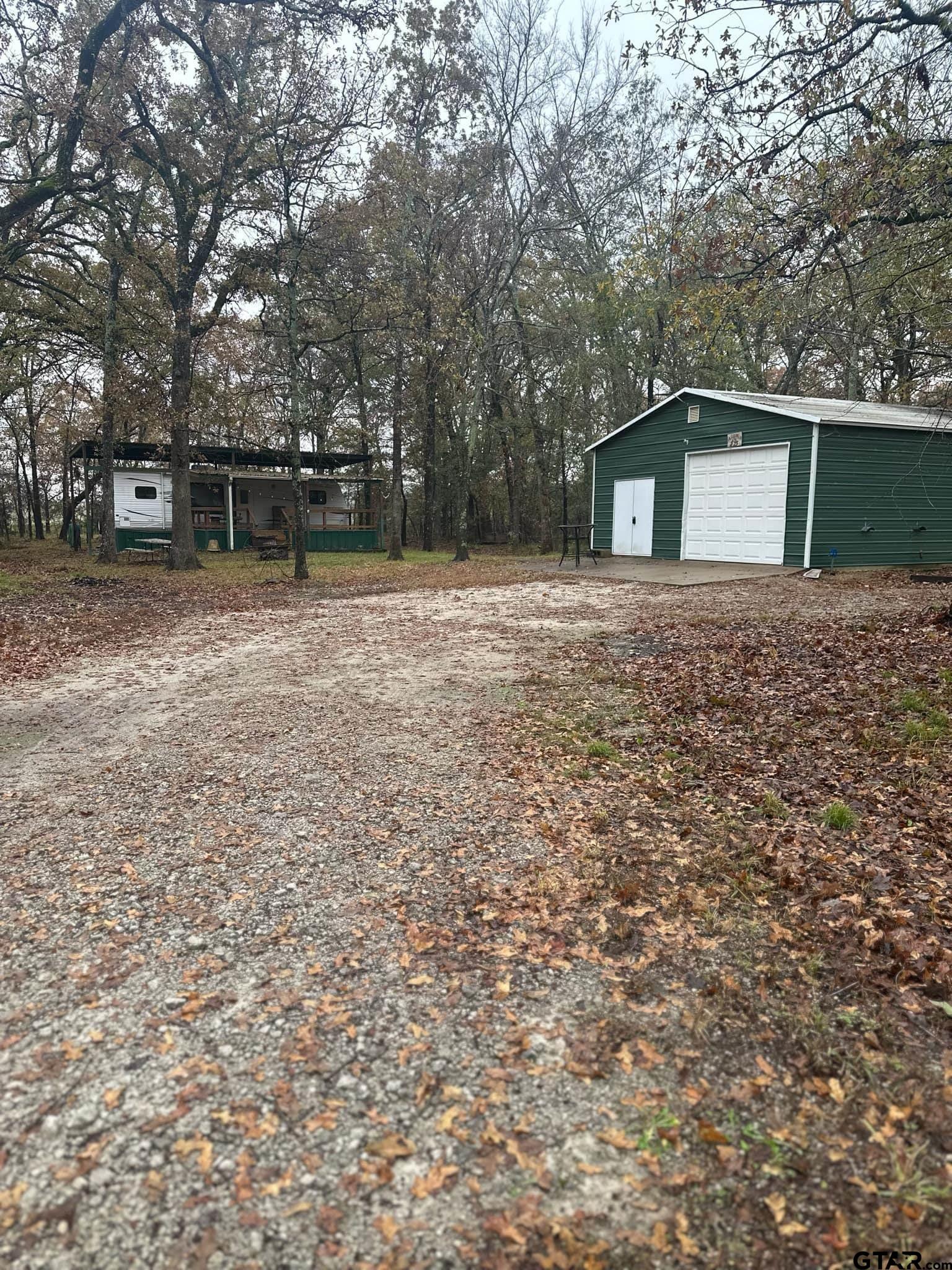 a house with trees in front of it