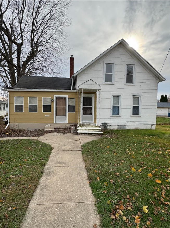 a front view of house with yard