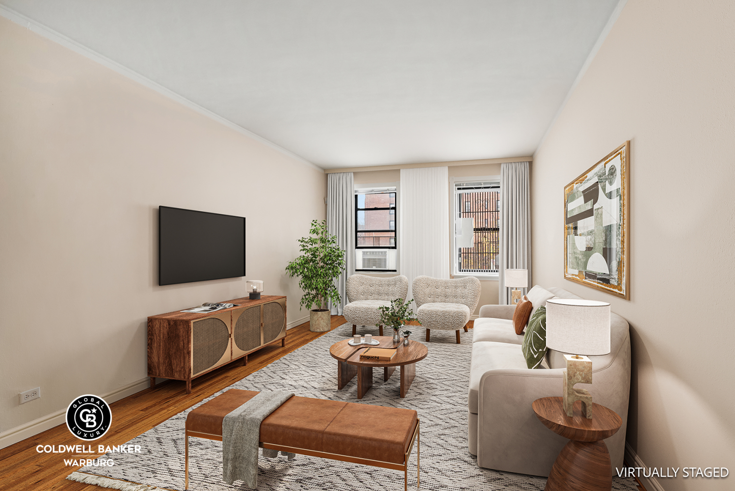 a living room with furniture and a flat screen tv