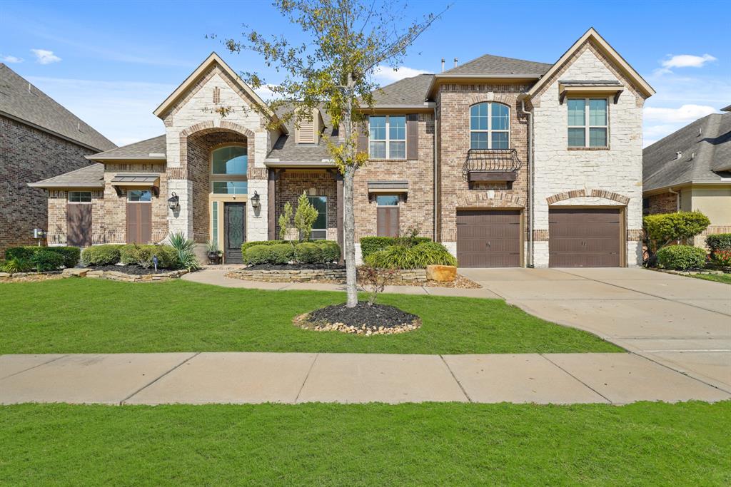 A Magnificent 80-foot Luxury home in an elite neighborhood-Aliana, bosting elegant architecture, expansive windows, and meticulously manicured landscaping that creates a sense of grandeur and exclusivity.