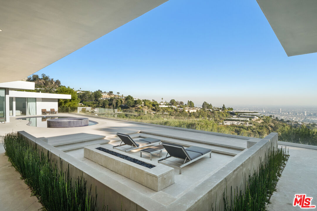 a view of a balcony with city view