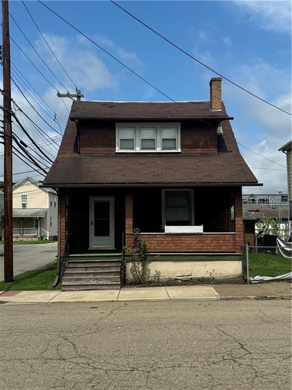 a front view of a house with a garage