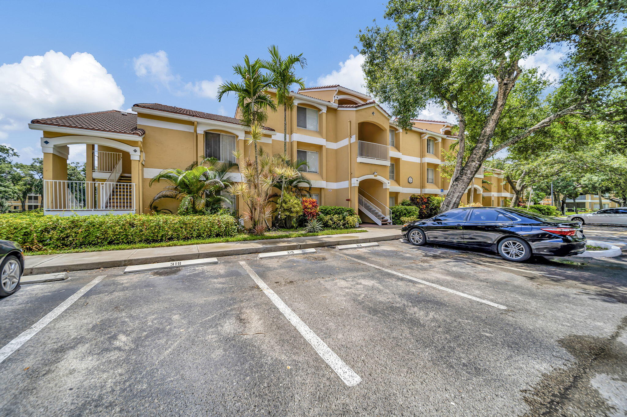 a view of a car parked in front of a building