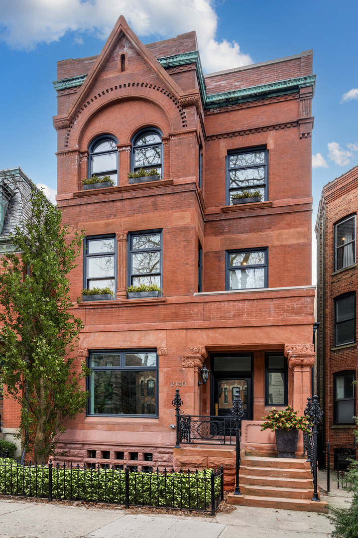 front view of a building with a porch