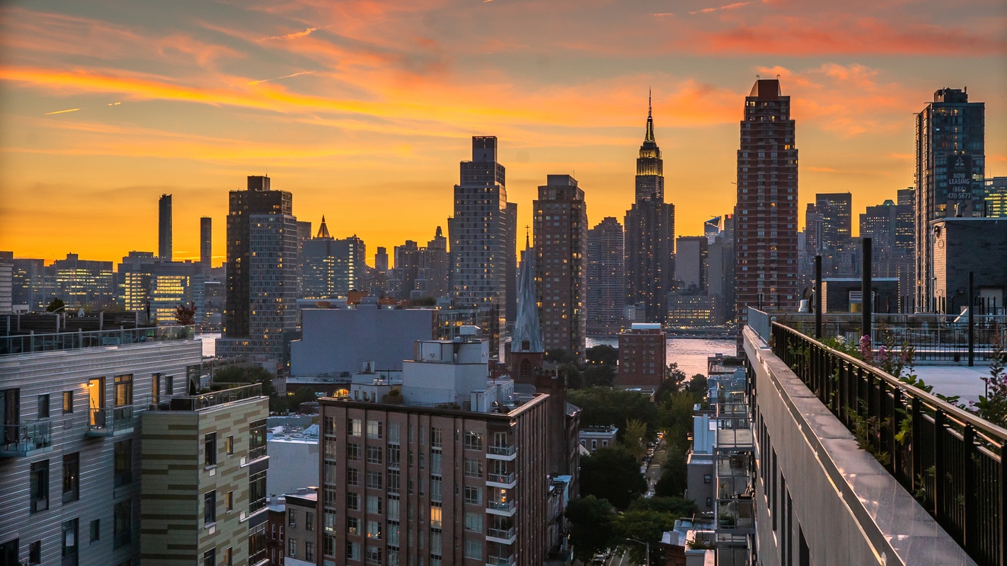 a view of a city with tall buildings