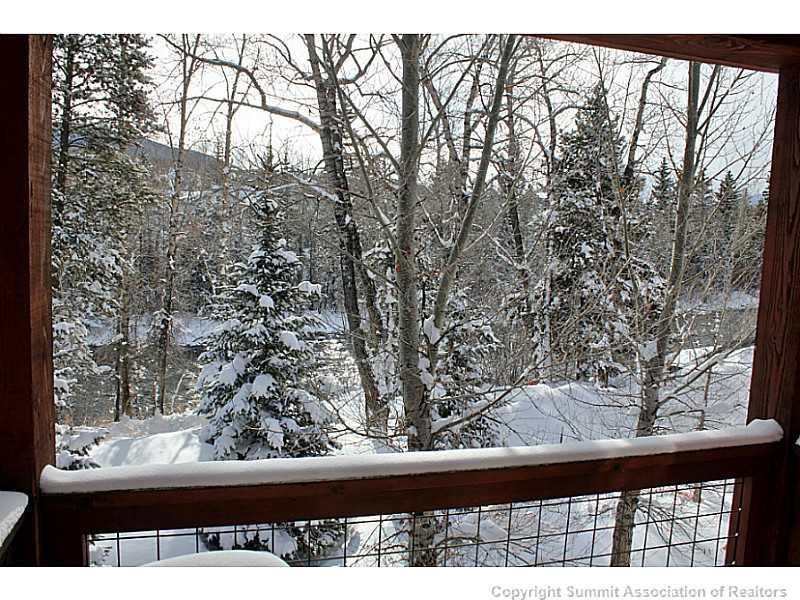 a view of trees from a window