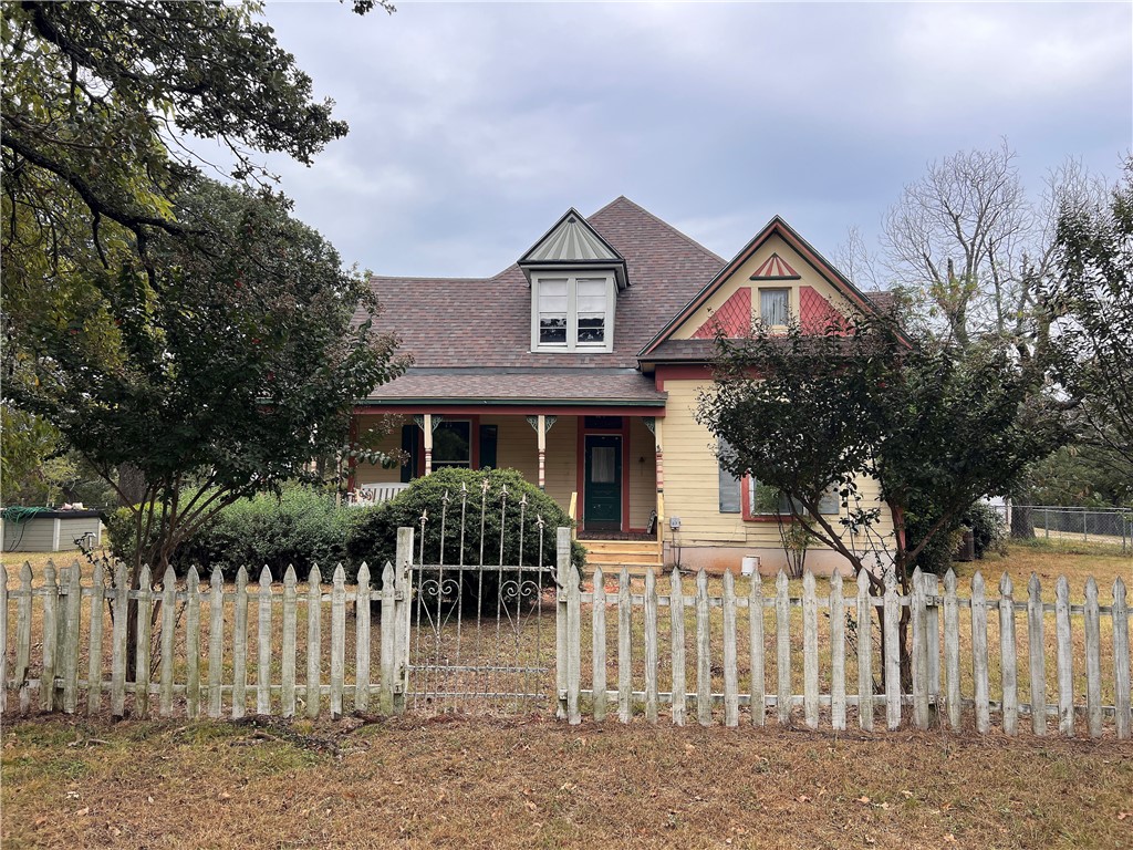 a front view of a house with a porch