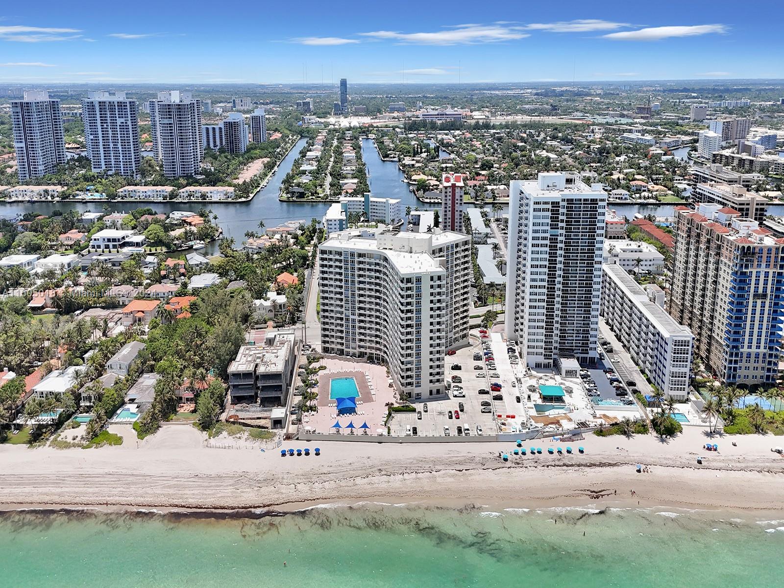 a view of a city with tall buildings