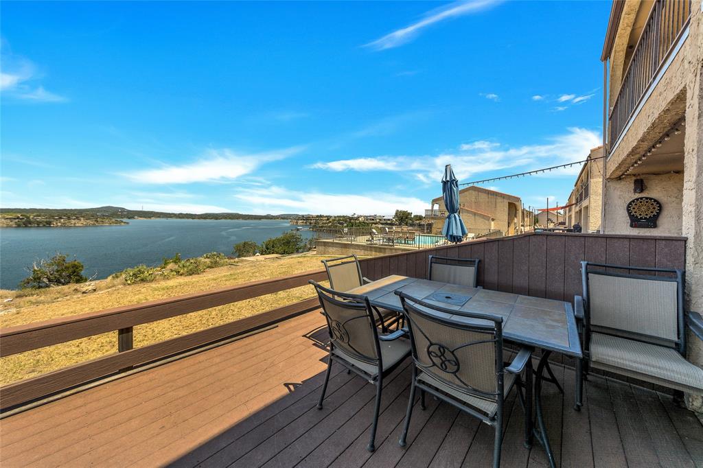 a view of a chairs and table on the terrace