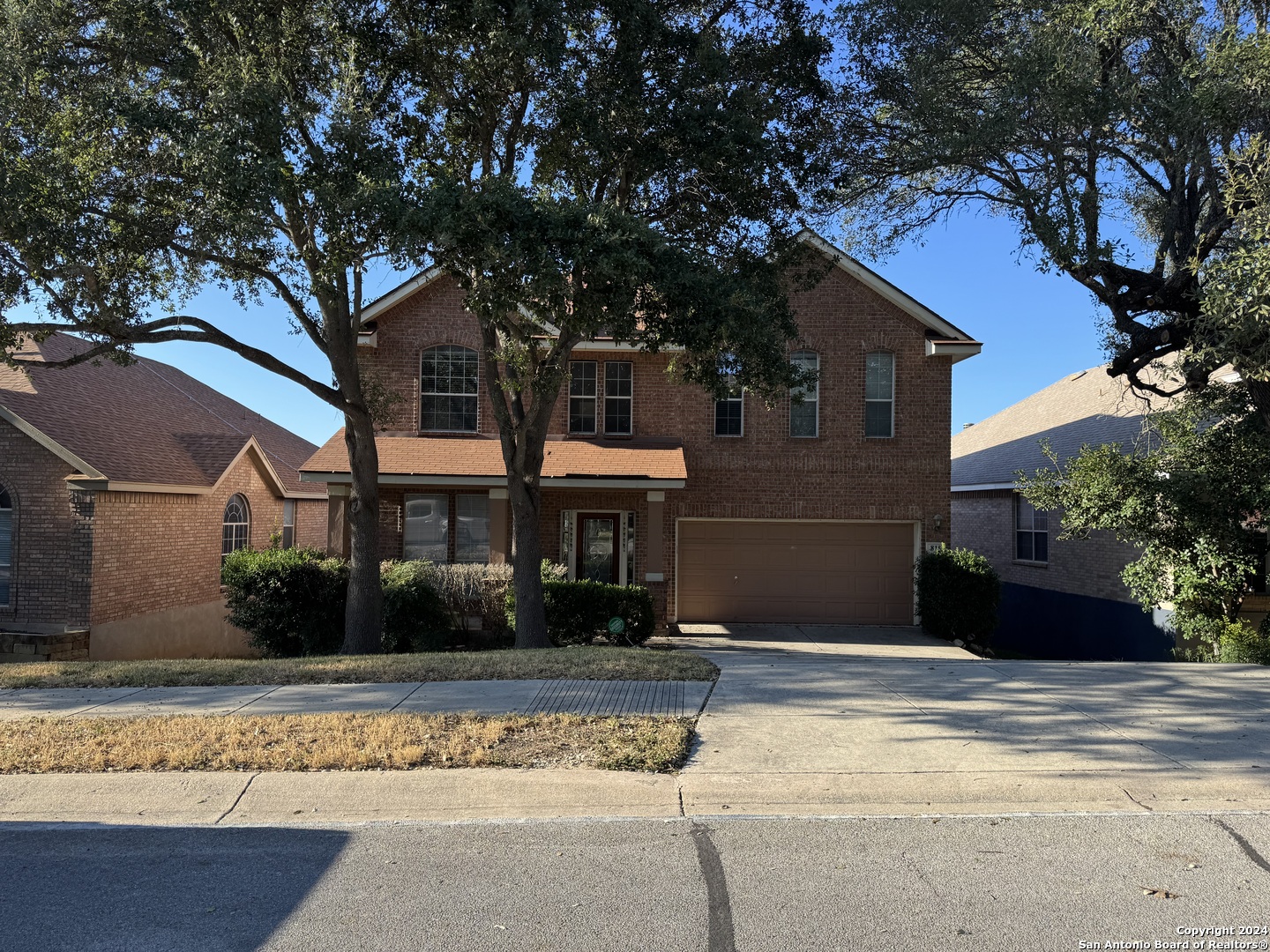 front view of a house with a street