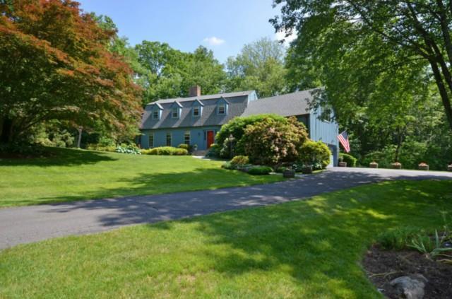 a view of a house with a garden