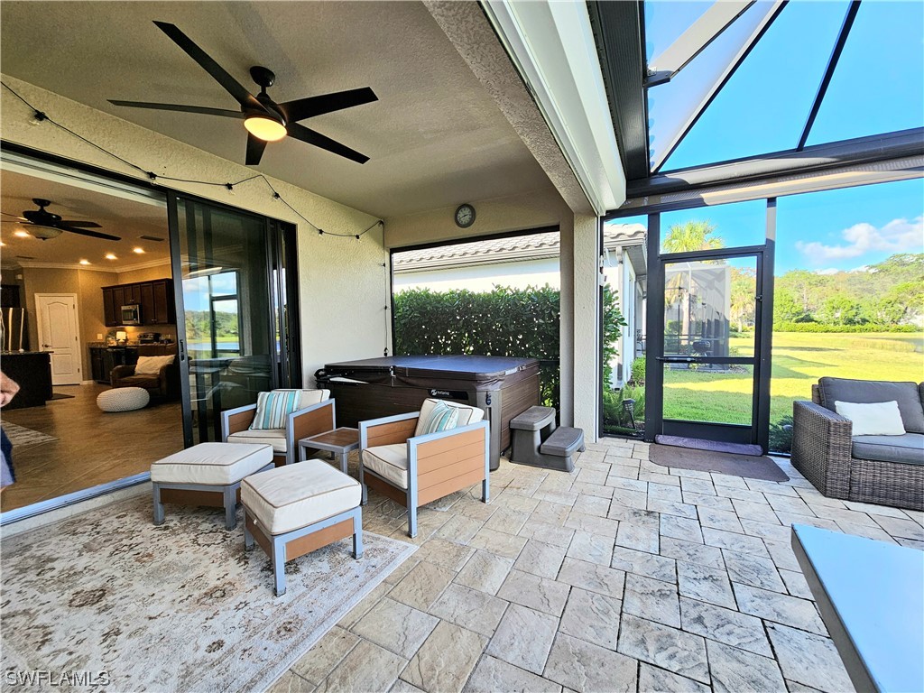 a lobby with furniture and a floor to ceiling window