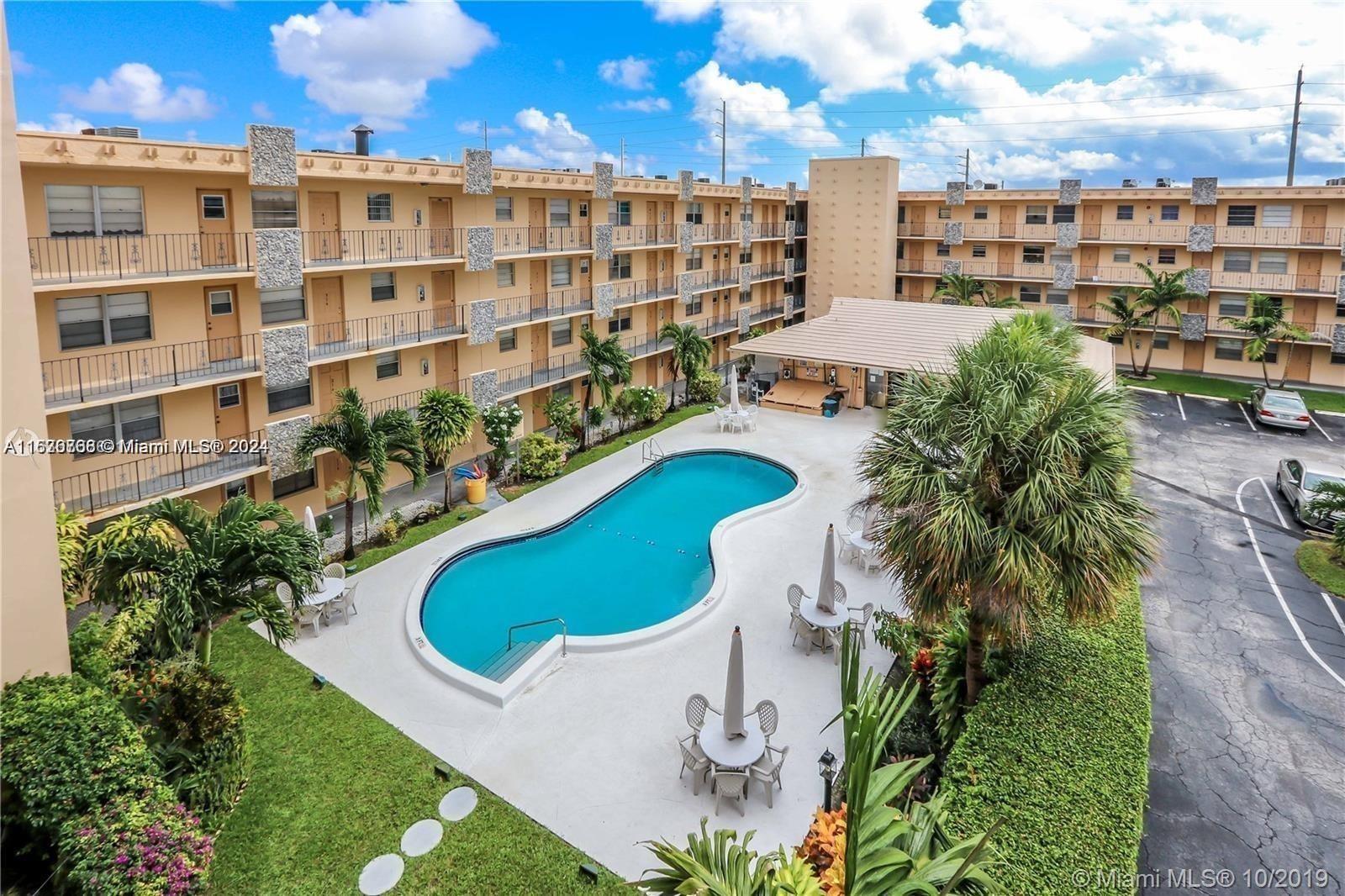 a view of a swimming pool and outdoor space