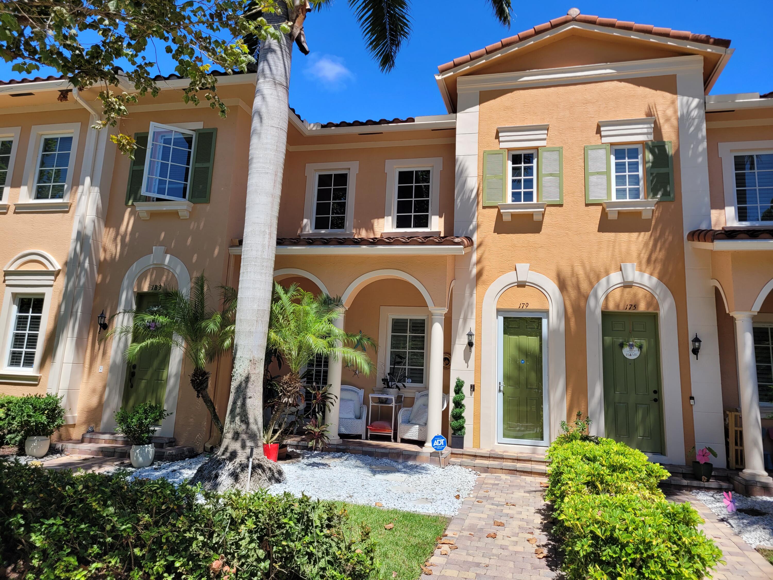 a front view of a house with a porch