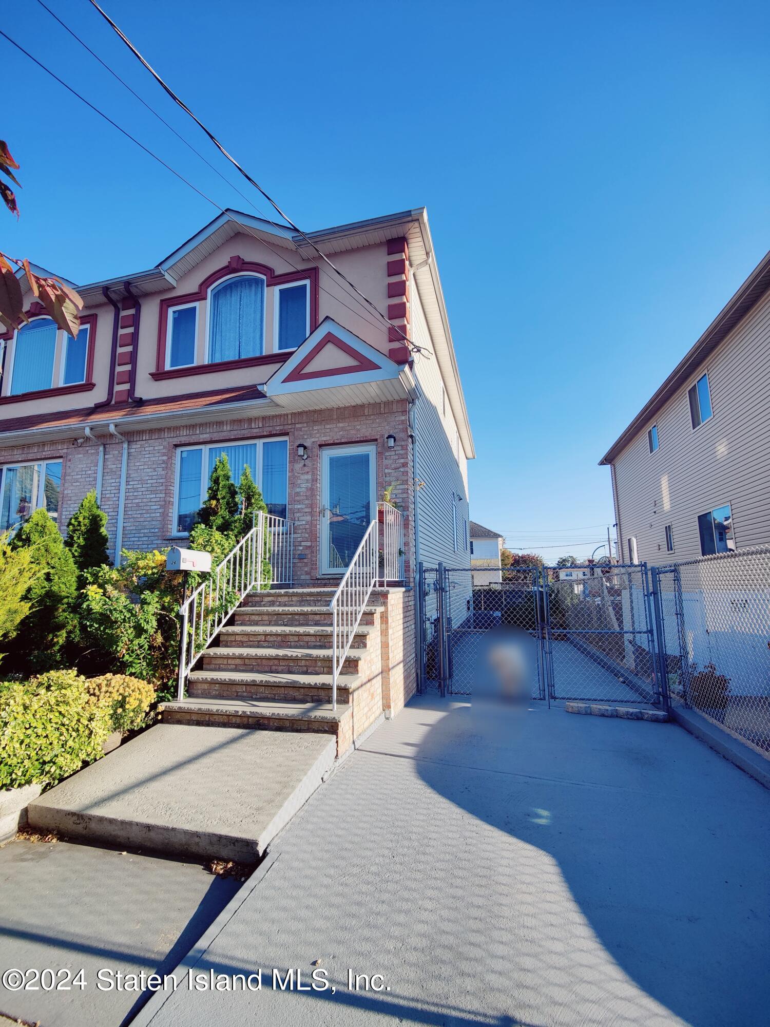 a view of a house with a patio