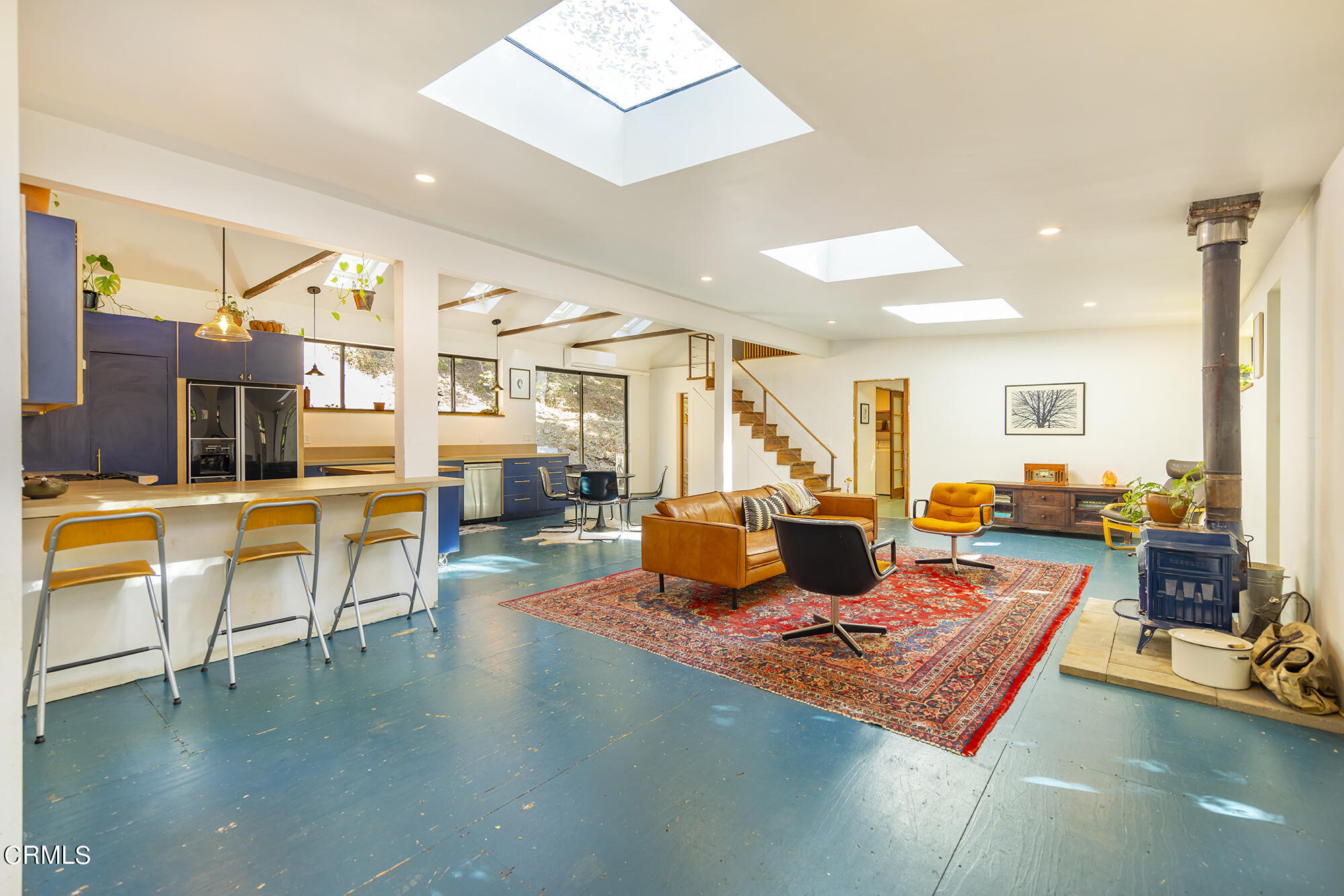 a living room with furniture and a table