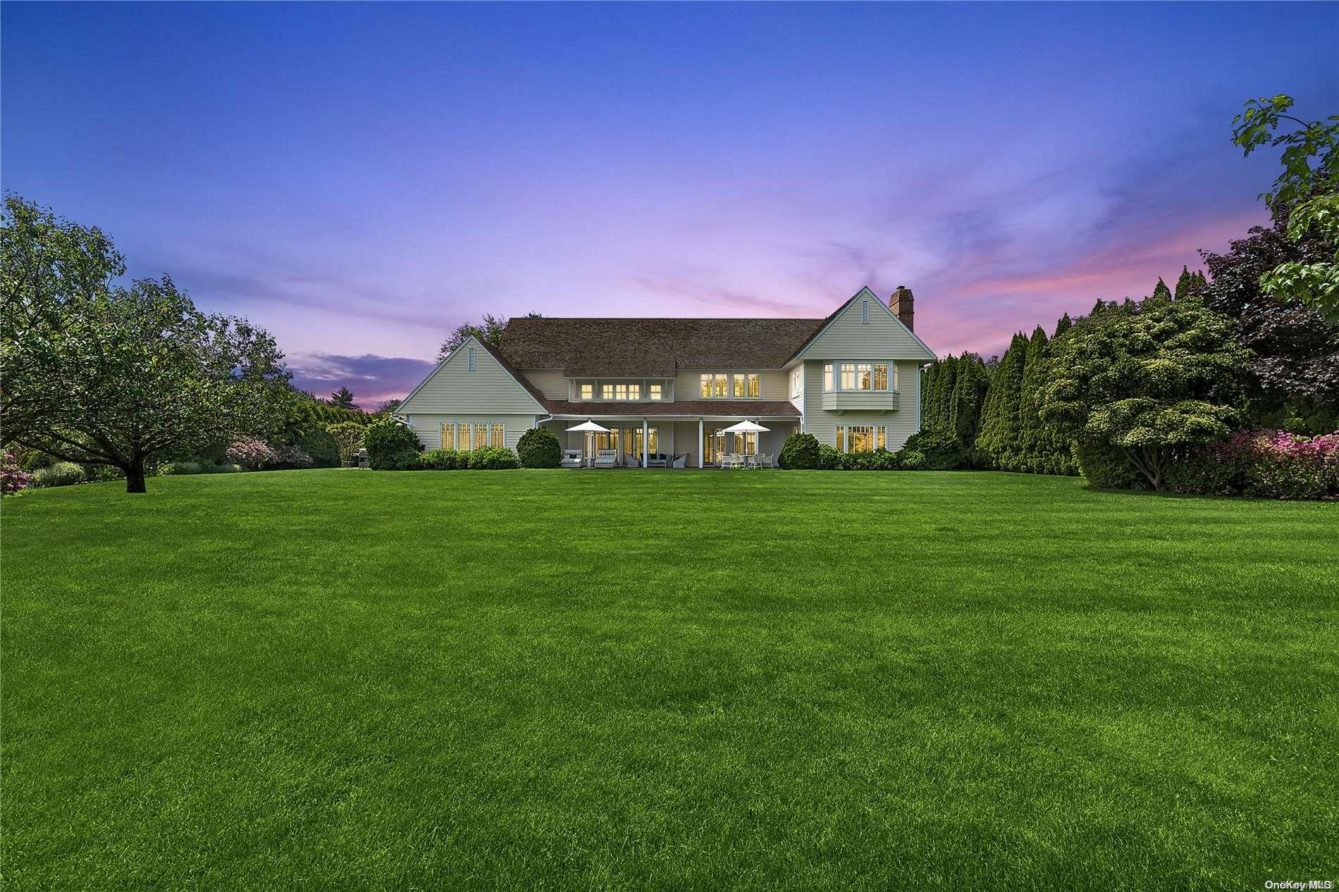 a view of a house with a big yard