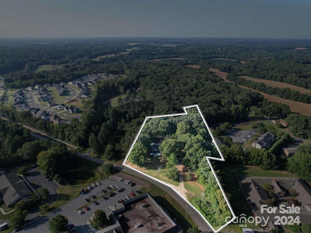 an aerial view of residential house with outdoor space