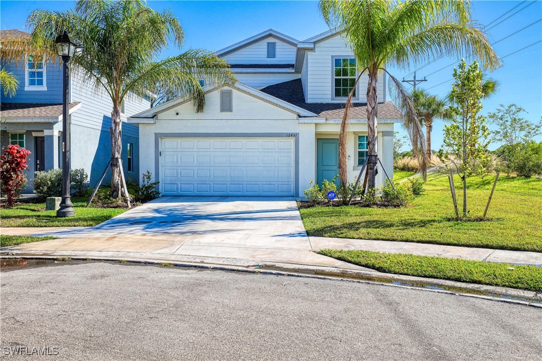 front view of a house with a small yard