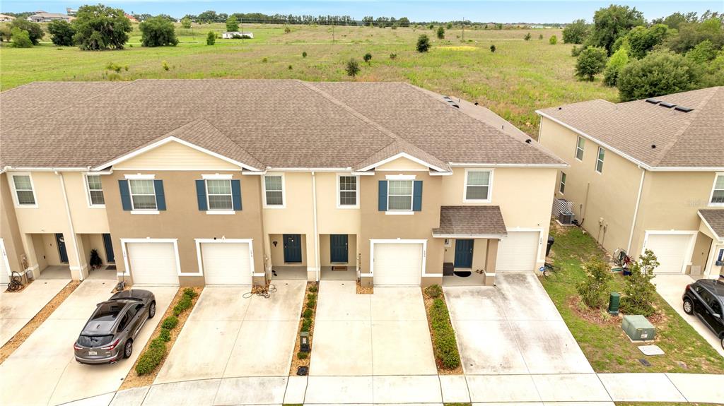 a aerial view of a house with a swimming pool