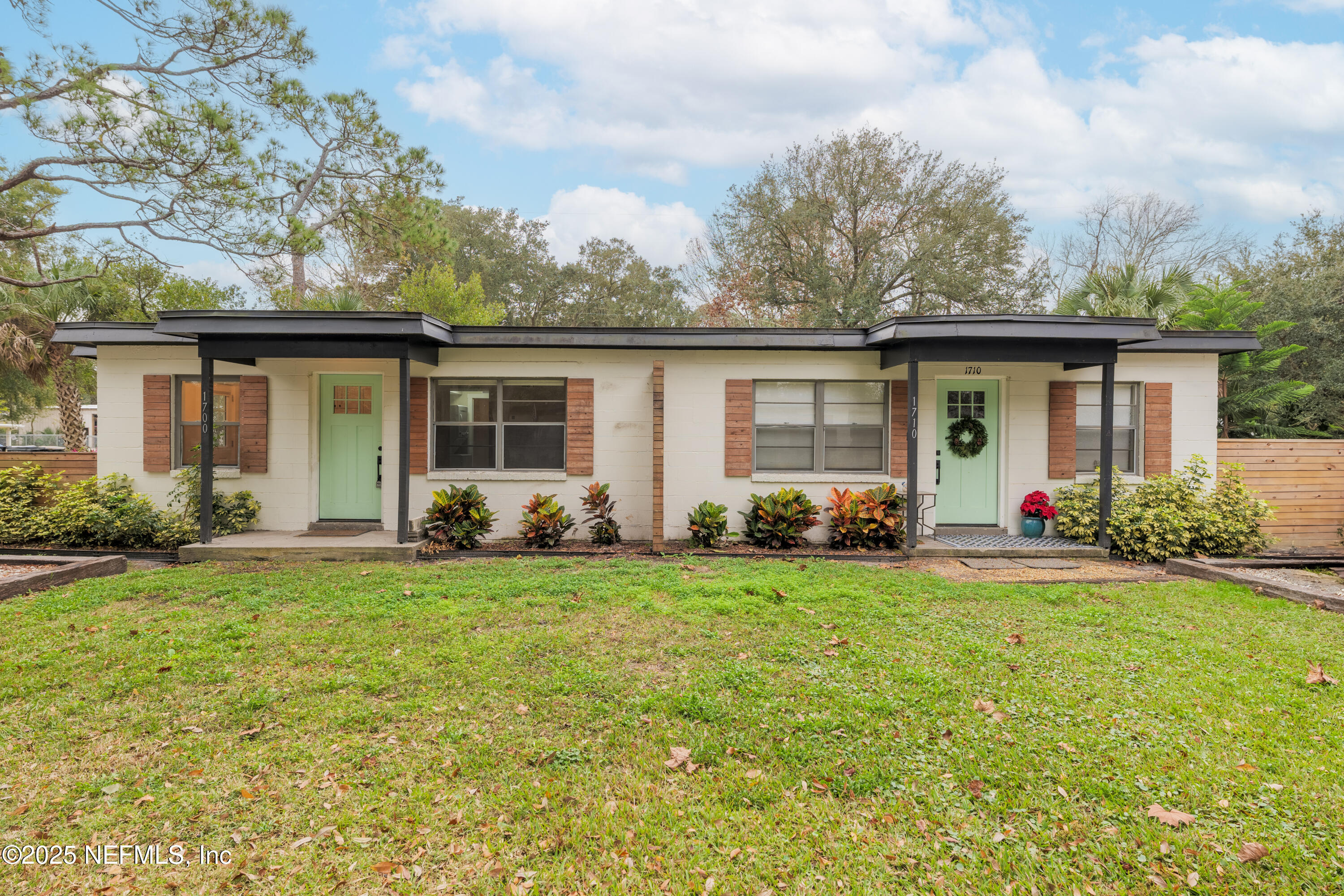 front view of a house and a yard