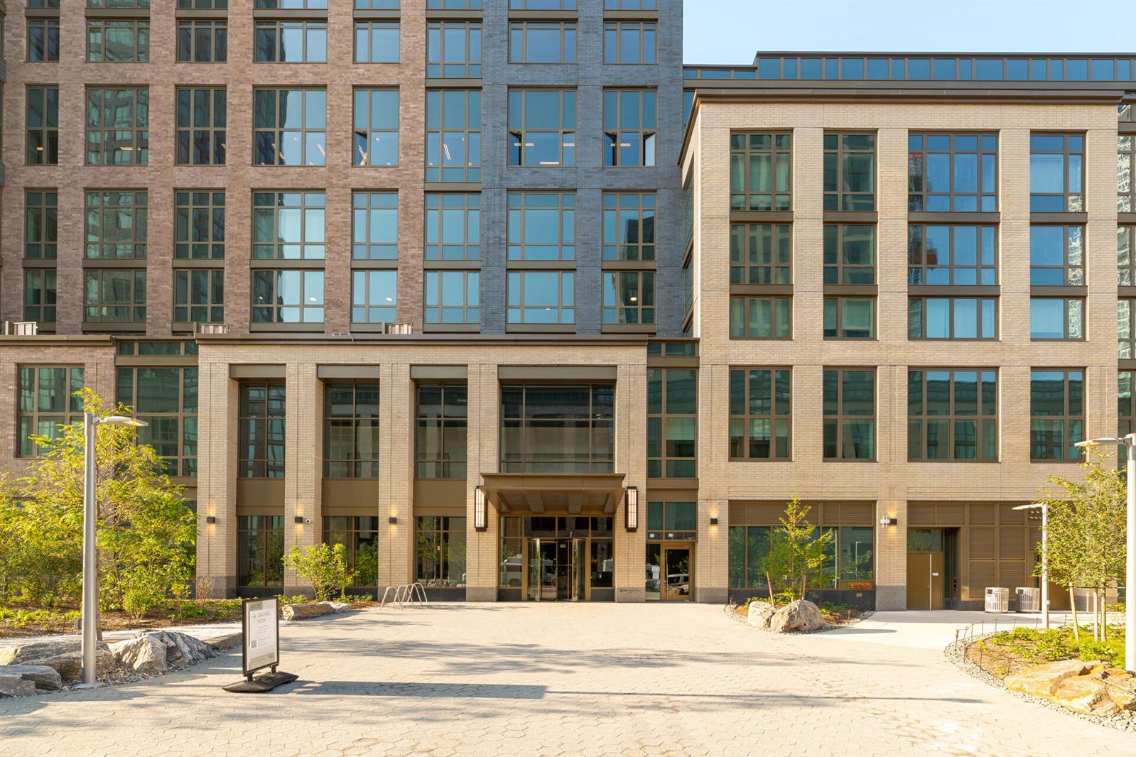 a view of a building with a street