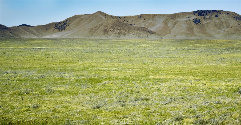 a view of a mountain with an outdoor space