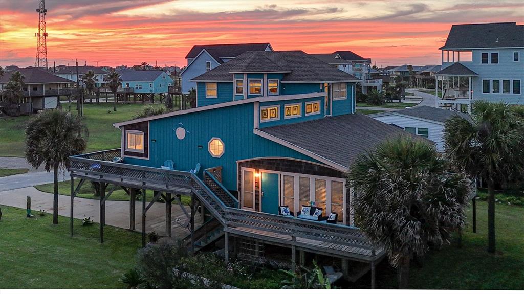 a view of a house with a roof deck