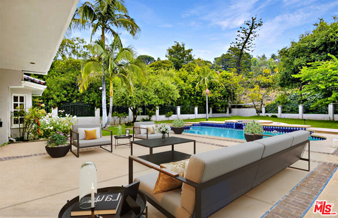 a view of a patio with swimming pool