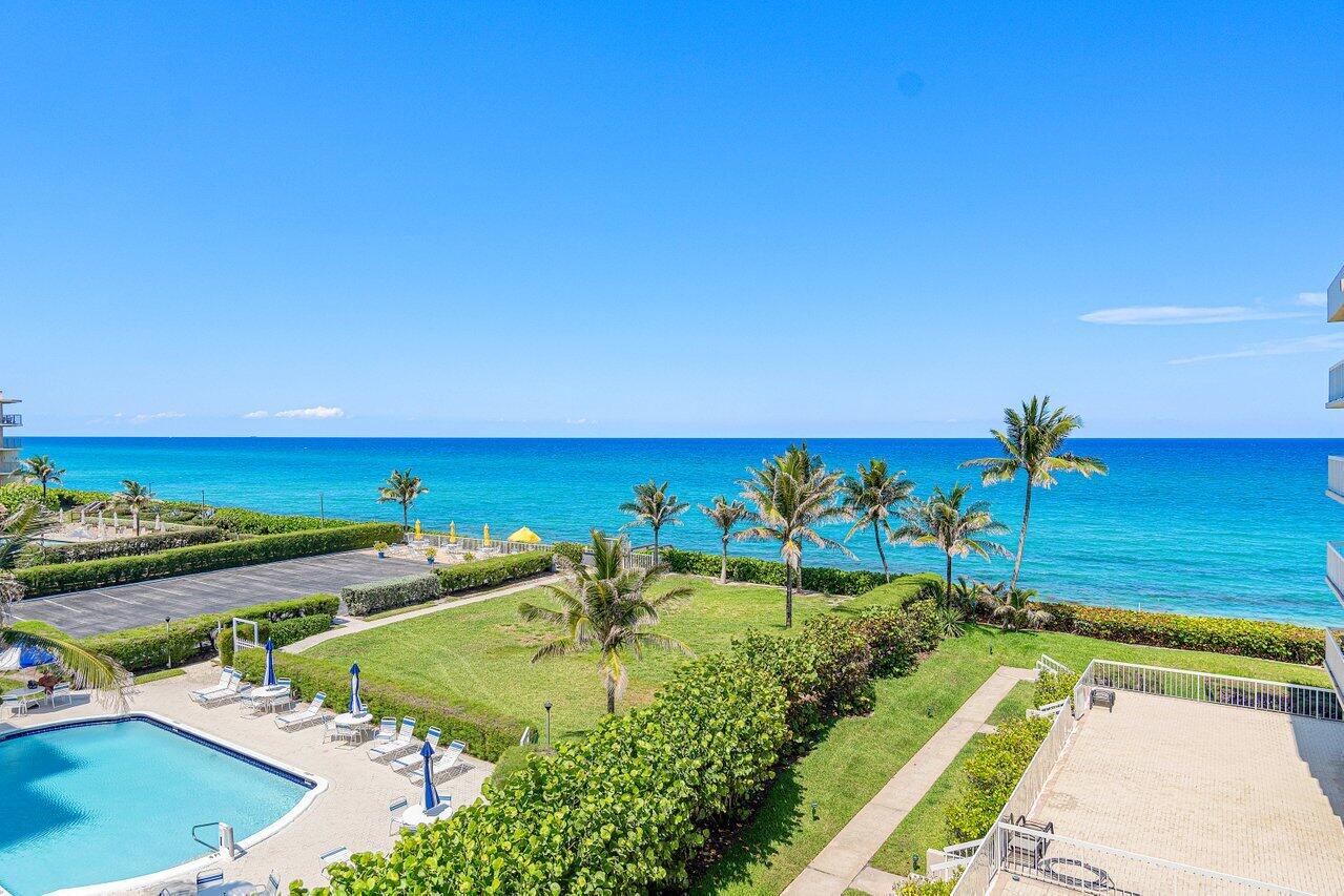 a view of a swimming pool with an outdoor space