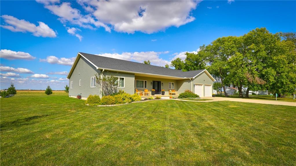 a view of a house with a big yard