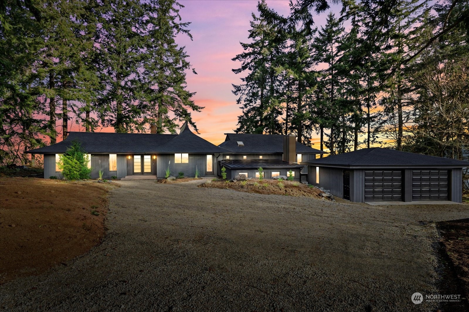 a view of a house with a tree