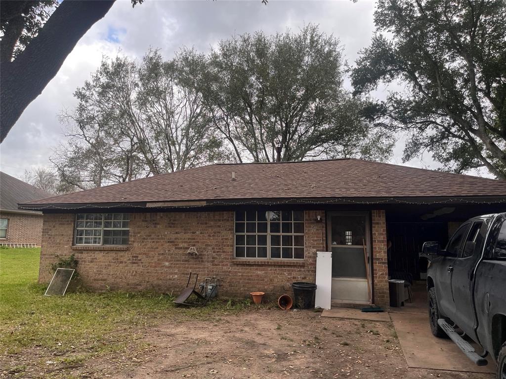 Brick 2 bedroom, 1 bath home just a little shy of an acre.