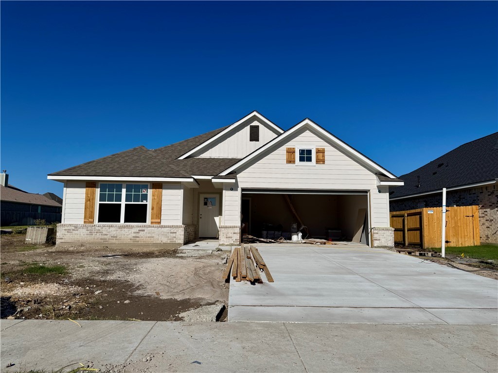 a front view of a house with yard