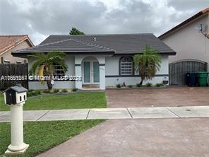 a view of a house with a patio