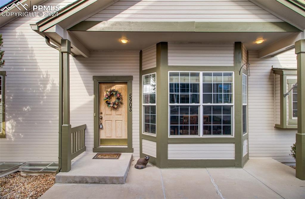 Doorway to property with a porch