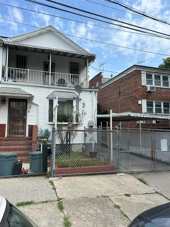 a front view of a house with balcony