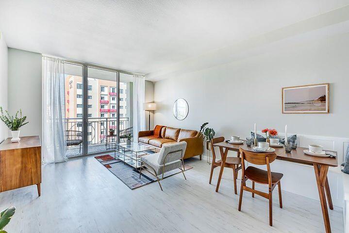 a living room with furniture and a window