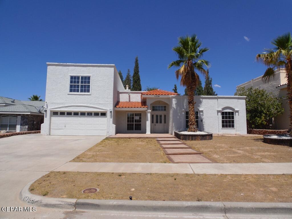 a front view of house with yard