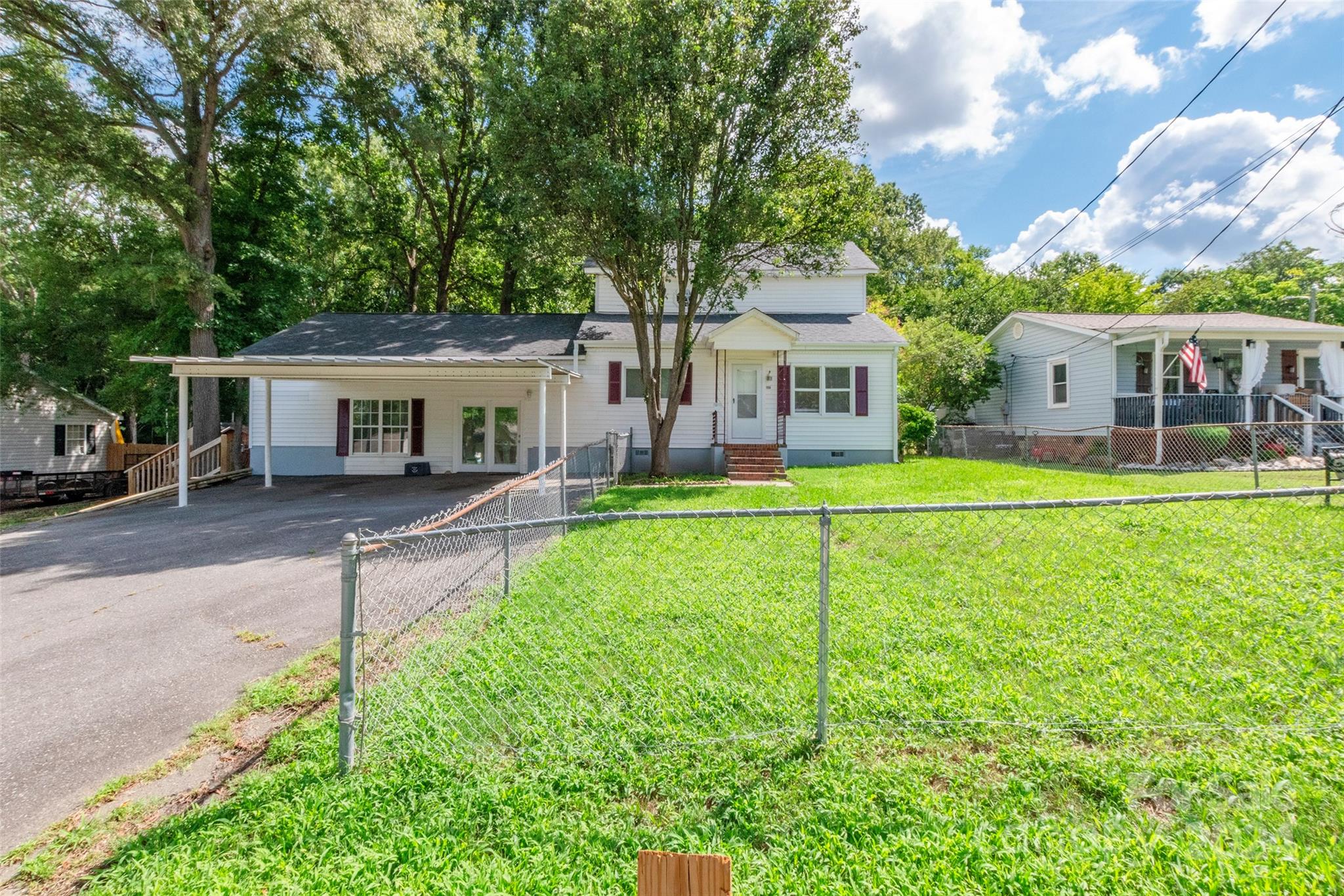 front view of a house with a yard