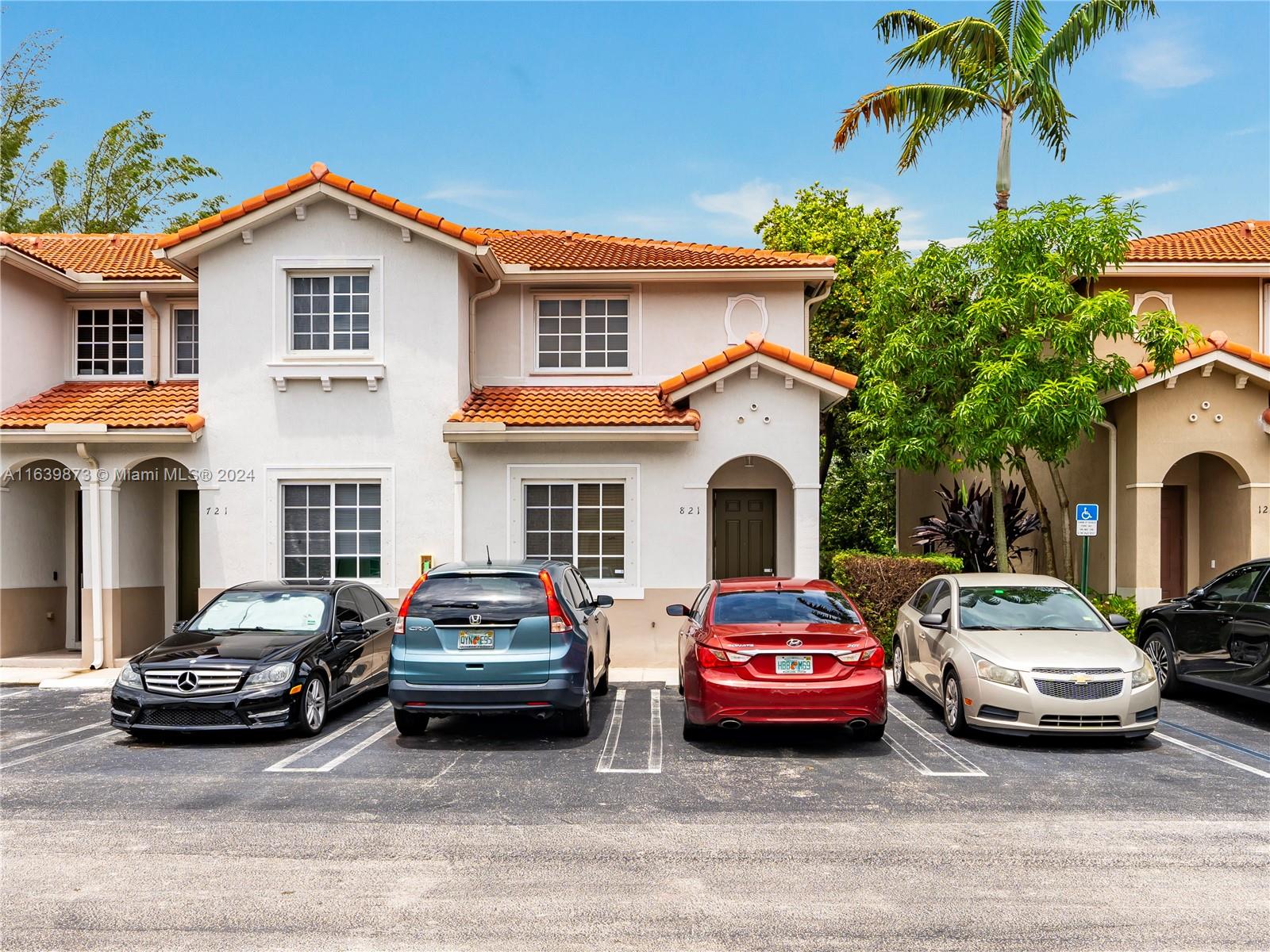 a car parked in front of a house